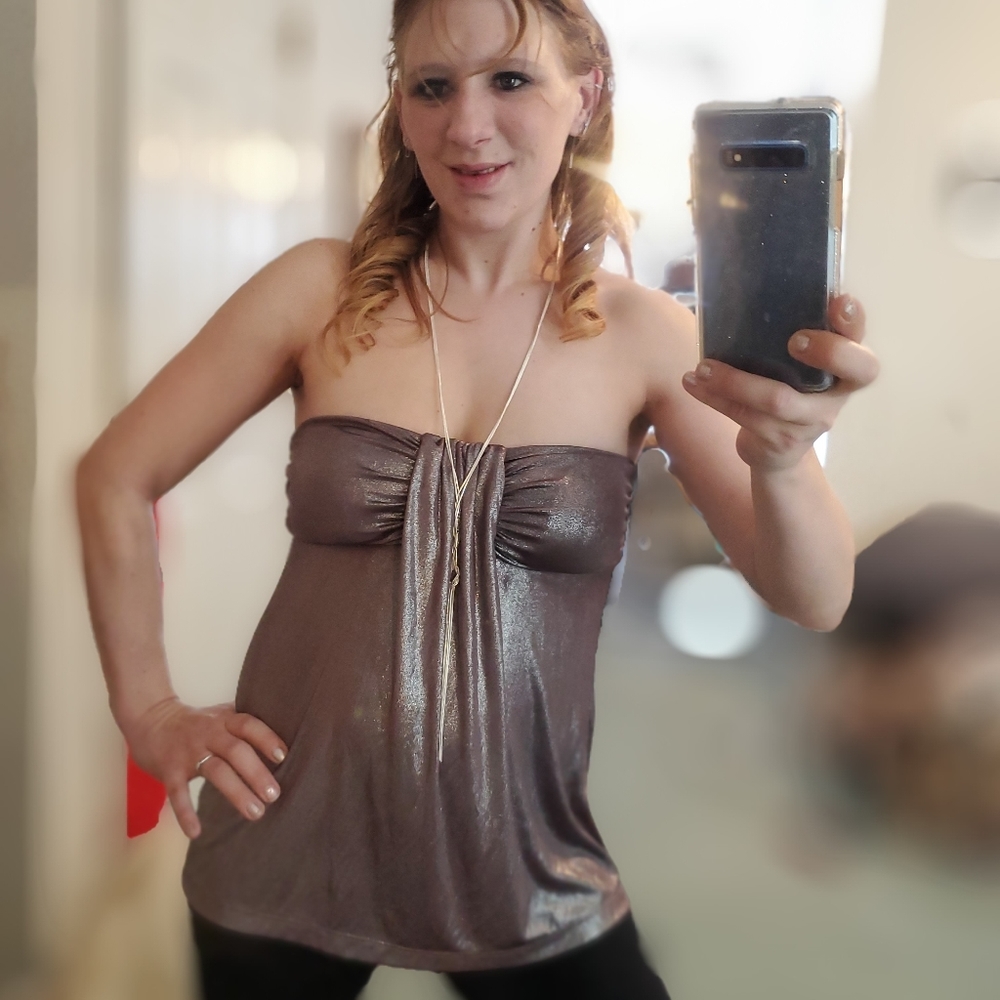 A strapless dark silver/bronze silky blouse